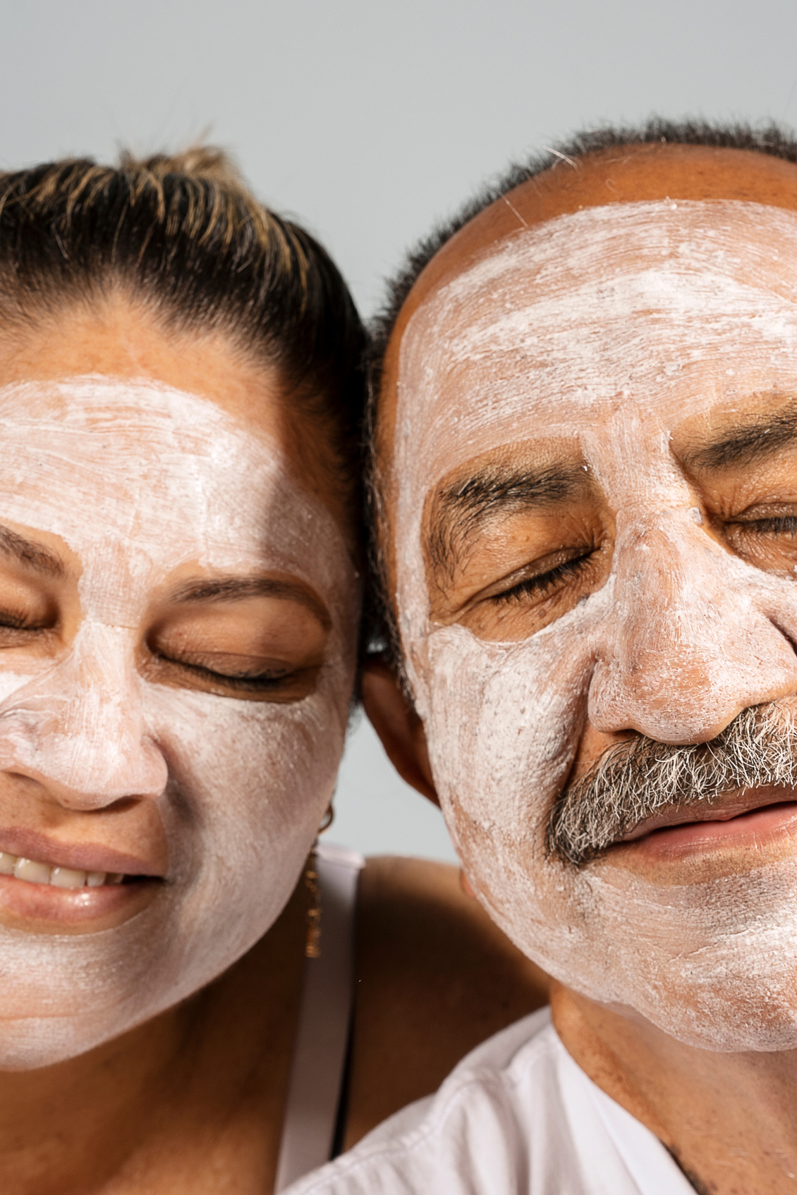 Man and Woman with Clay Mask